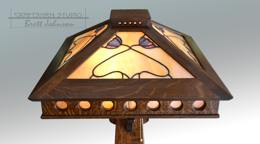 Arts and Crafts style handcrafted oak lamp with warm amber glow - Craftsmen Studio